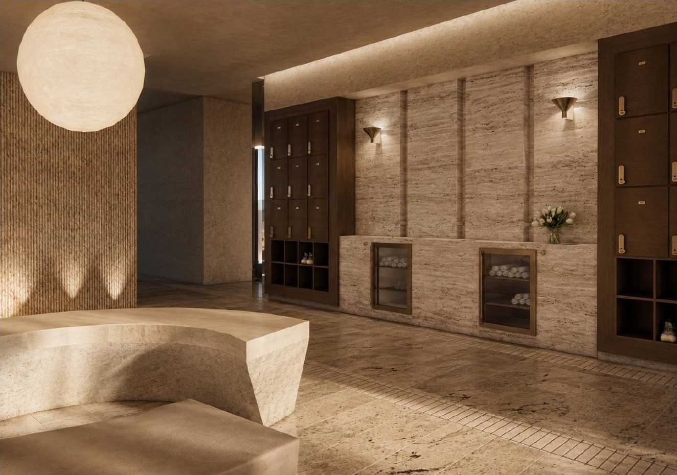 The water station, rolled towels behind bronze framed glass