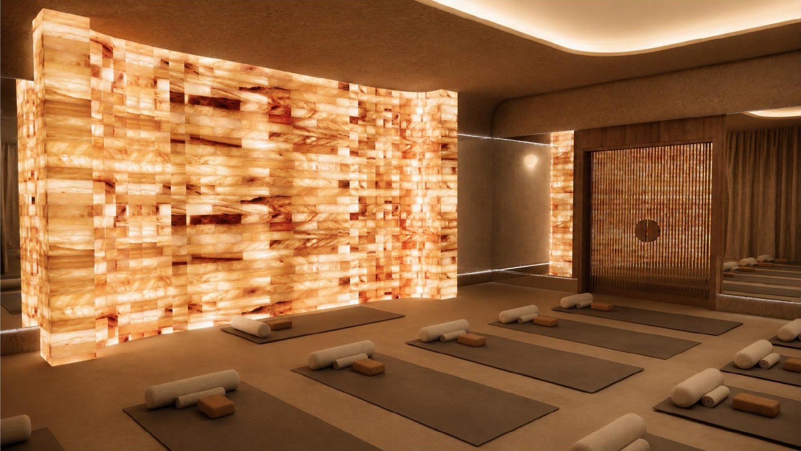 The heated yoga studio and its backlit salt wall