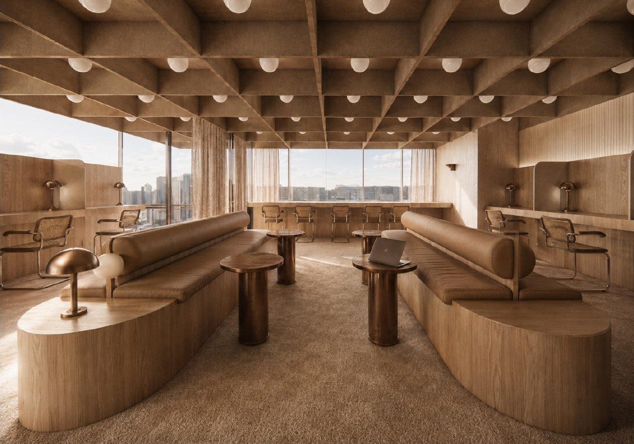 The co-working area under a waffle ceiling, city view through the glass
